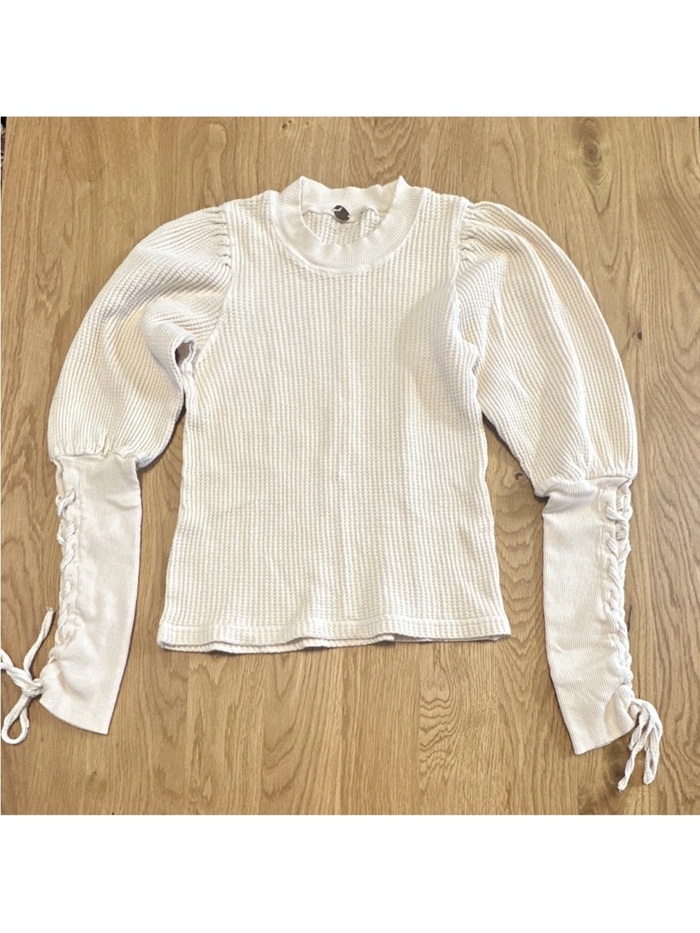 NWOT Free People Ivory Puff Long Sleeve Ribbed Knit Top with Lace-Up Cuffs S